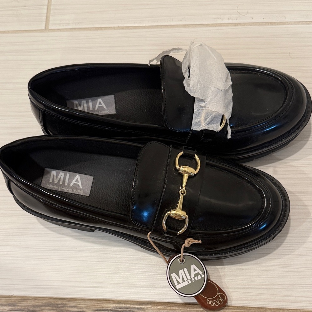 MIA Glossy Black Loafers with Gold Accent